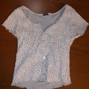 Blue and White flowered Brandy Melville Shirt.